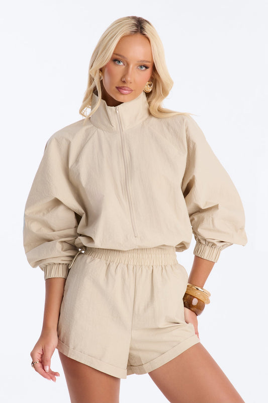 On The Move Windbreaker Long Sleeve Romper - Tan