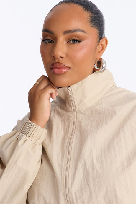 On The Move Windbreaker Long Sleeve Romper