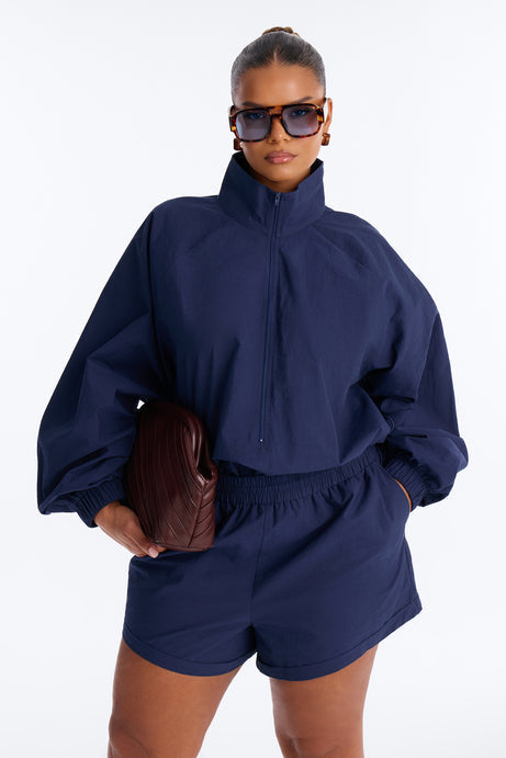 On The Move Windbreaker Long Sleeve Romper