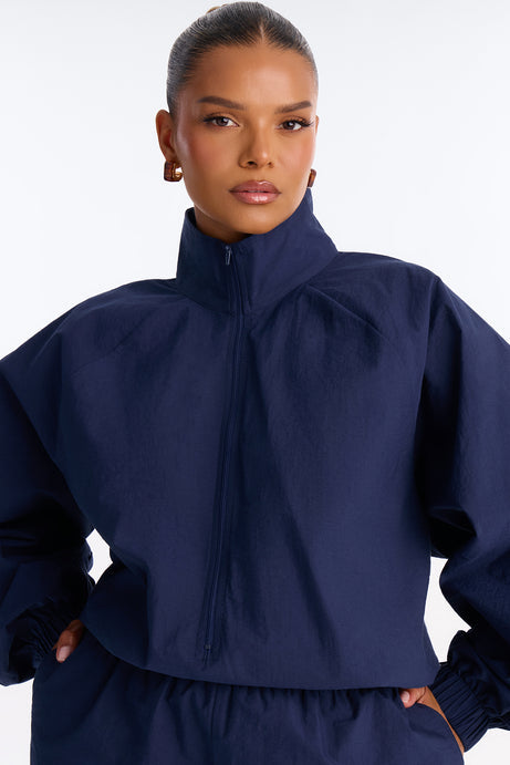 On The Move Windbreaker Long Sleeve Romper