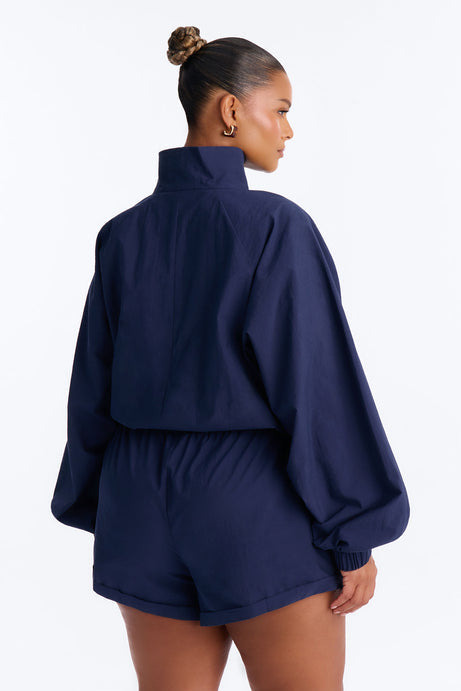 On The Move Windbreaker Long Sleeve Romper