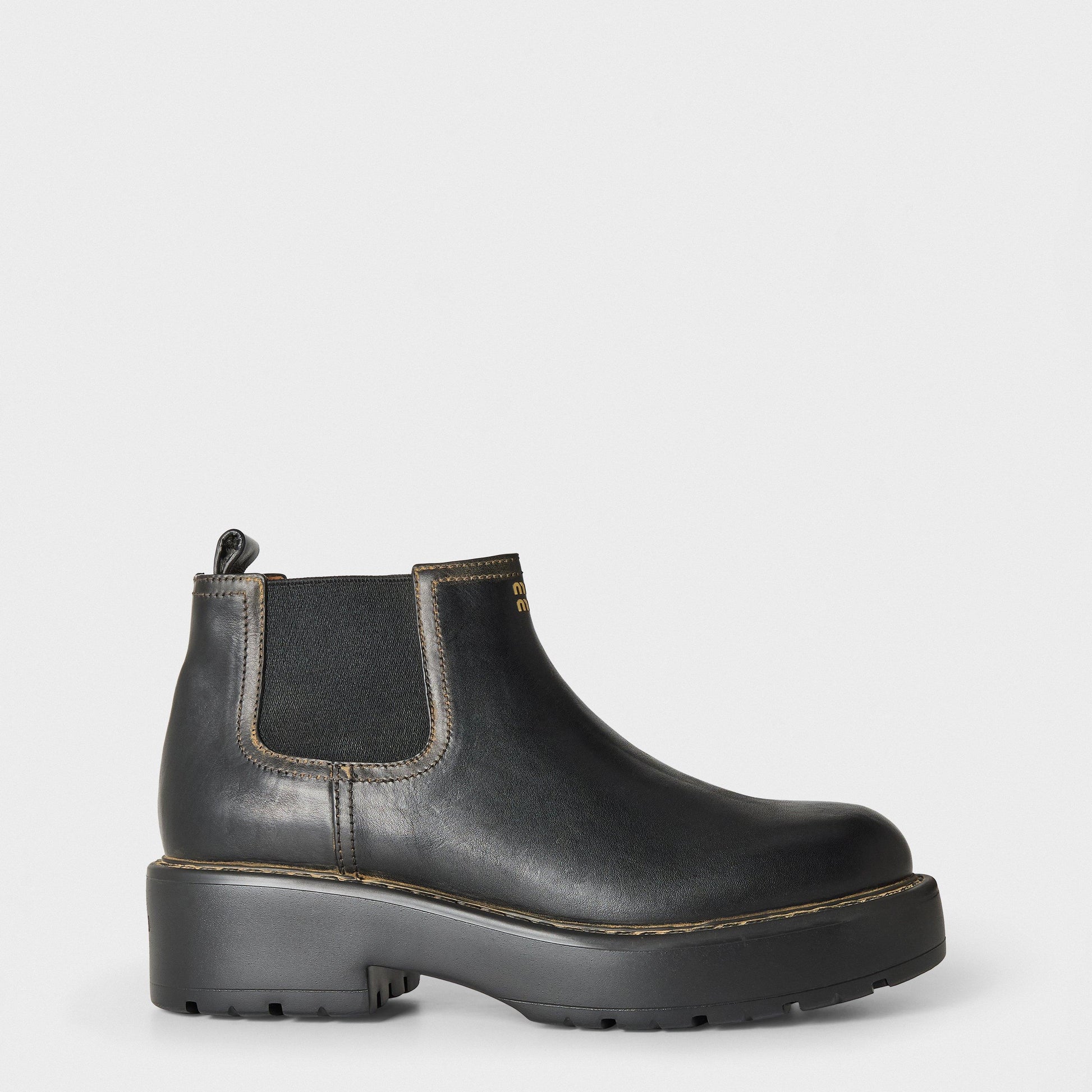 Miu Miu Women's Streamlined Low Heel Flat Ankle Boots