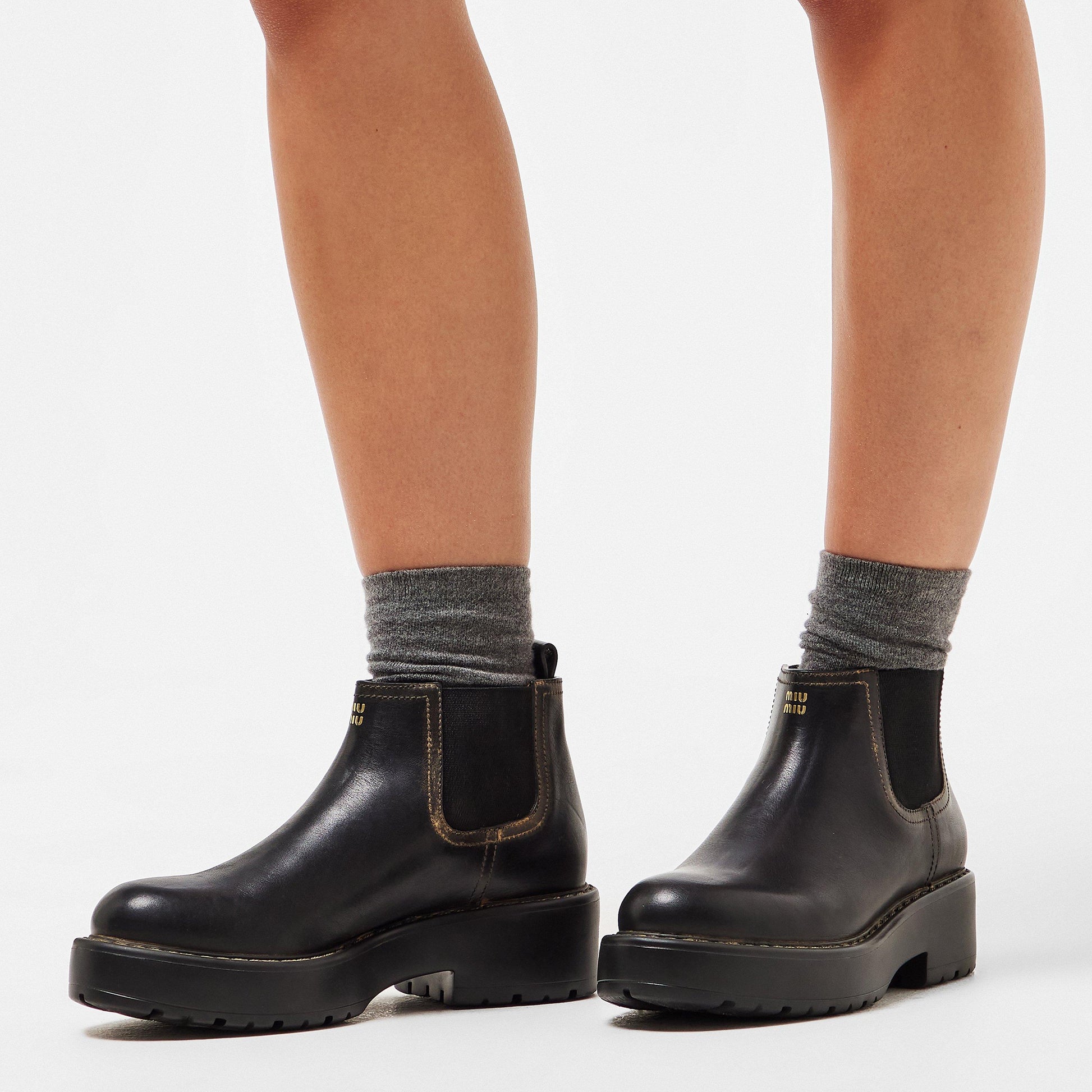 Miu Miu Women's Streamlined Low Heel Flat Ankle Boots