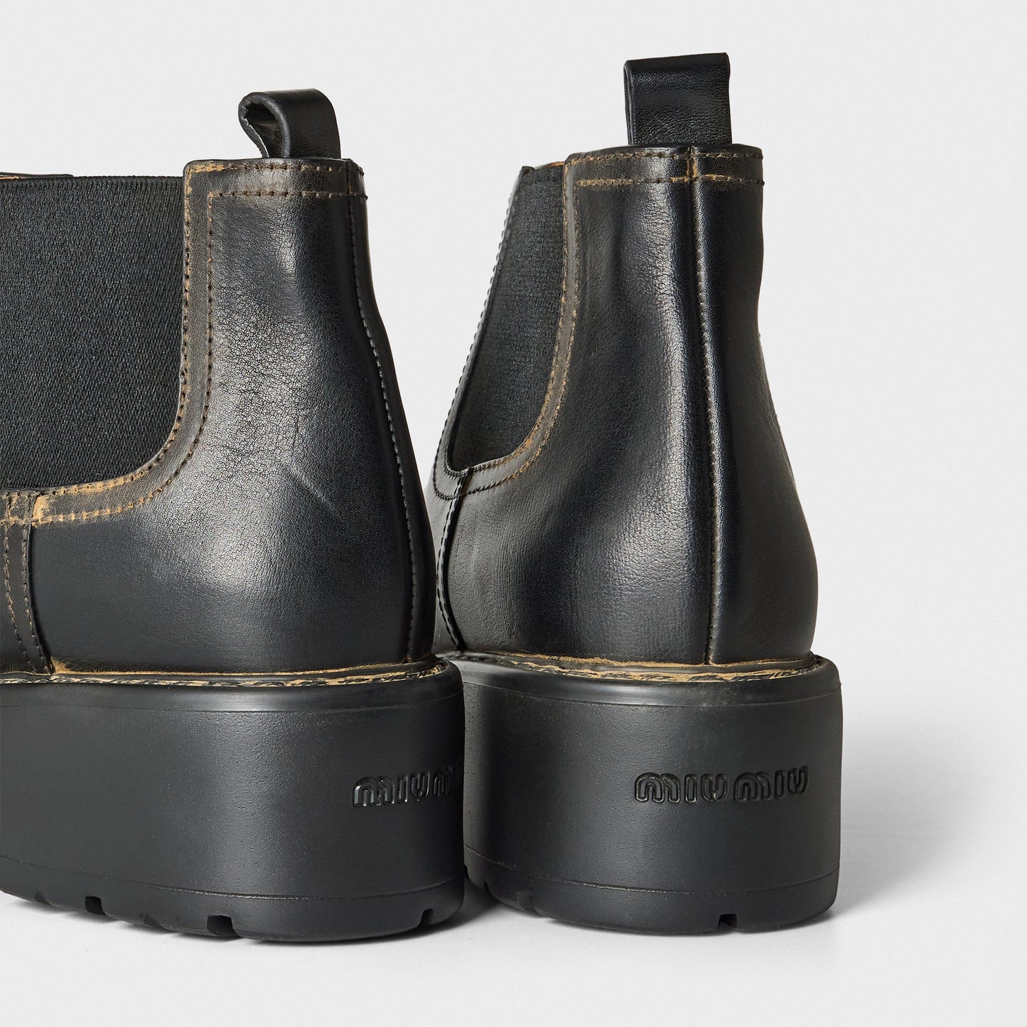 Miu Miu Women's Streamlined Low Heel Flat Ankle Boots