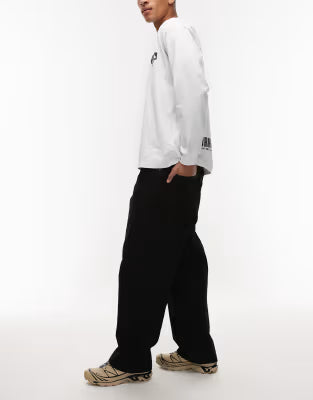 Carhartt WIP brandon loose straight fit denim jeans in black with constrast stitching