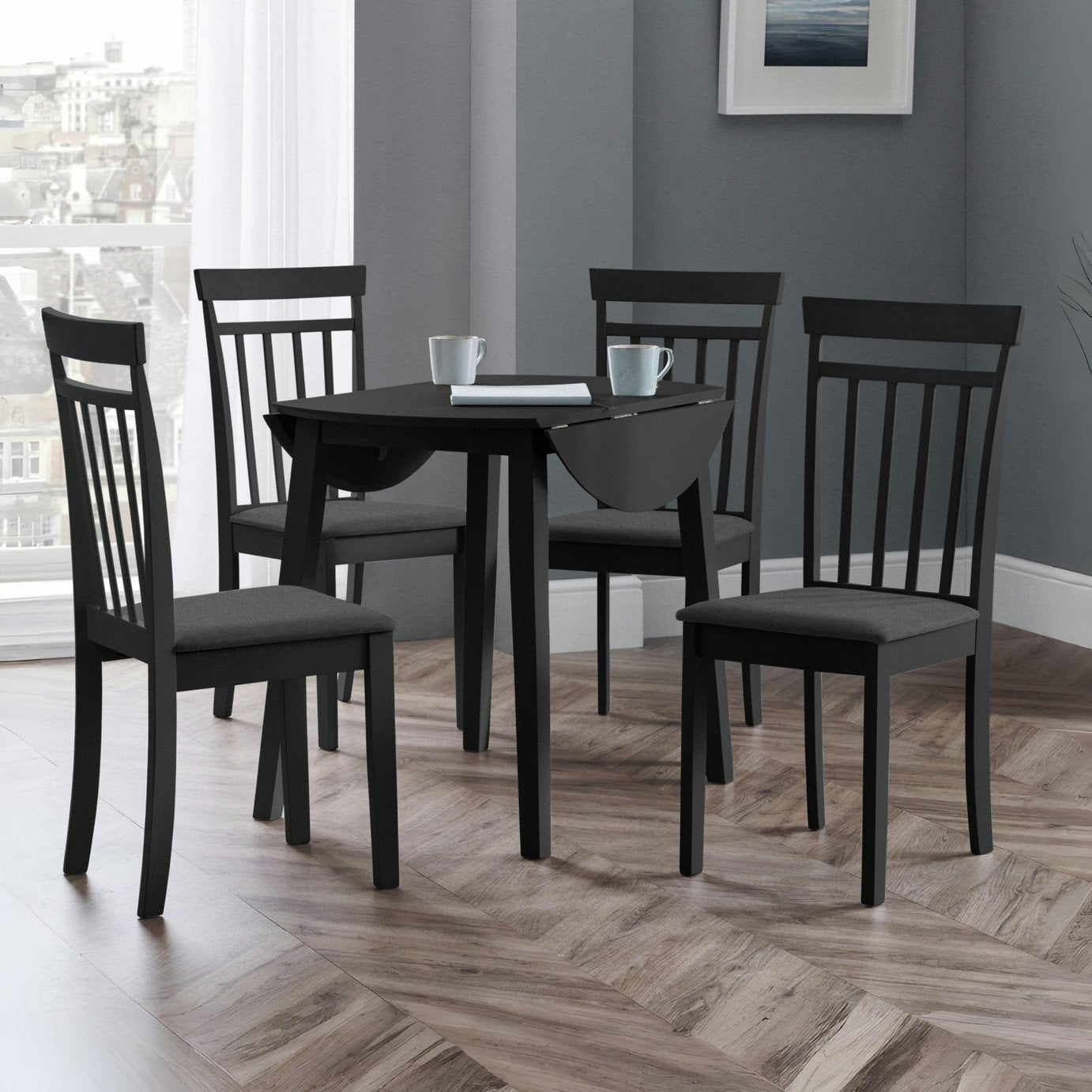 Julian Bowen Coast Ext 4 Seater Round Dining Table - Black