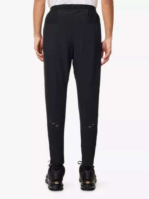 NIKE Core Stride Tapered-Leg Stretch-Woven Jogging Bottoms