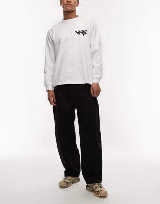 Carhartt WIP brandon loose straight fit denim jeans in black with constrast stitching